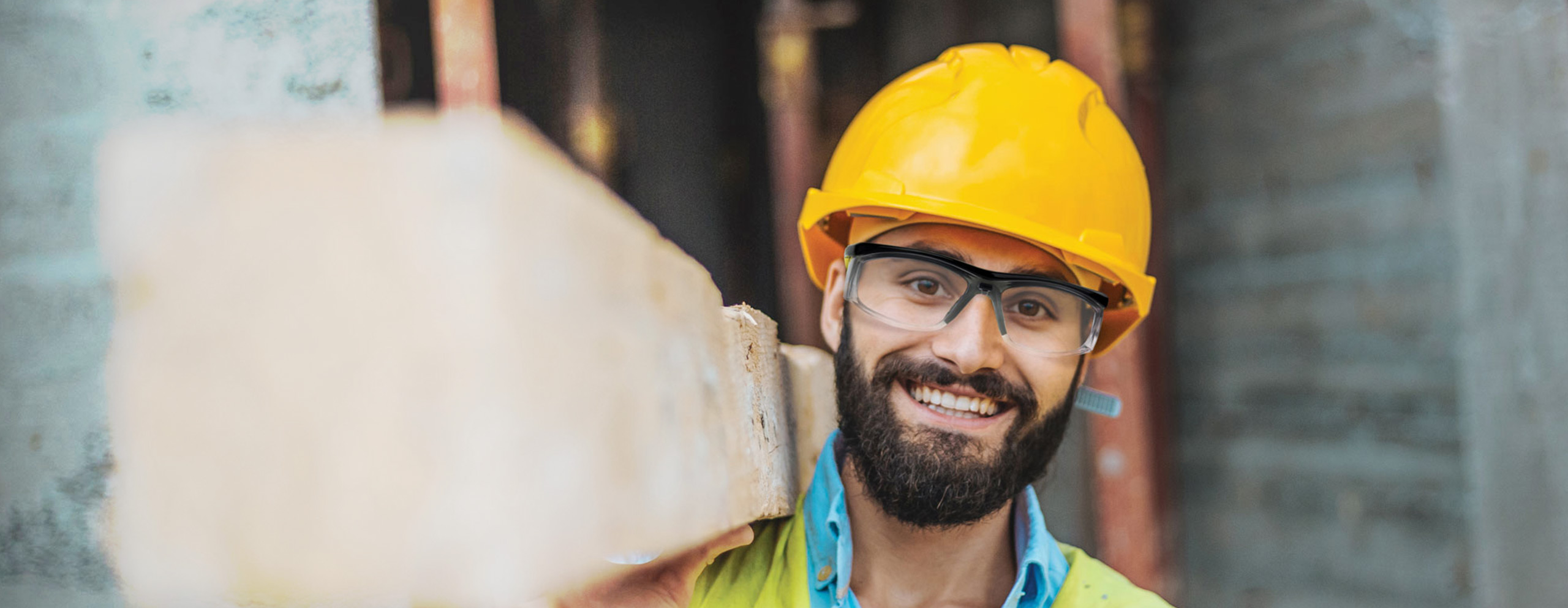 Construction worker wearing safety glasses